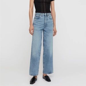 Totême high rise wide leg light wash jeans